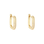 Dit zijn goudkleurige oorbellen met een rechthoekige vorm. Aan de voorzijde zitten siersteentjes, zirconia diamantjes. de oorbellen zijn gemaakt van gold plated en verkleuren niet, dus stainless steel. Op deze foto zie je de goede oorbellen met een witte achtergrond.
